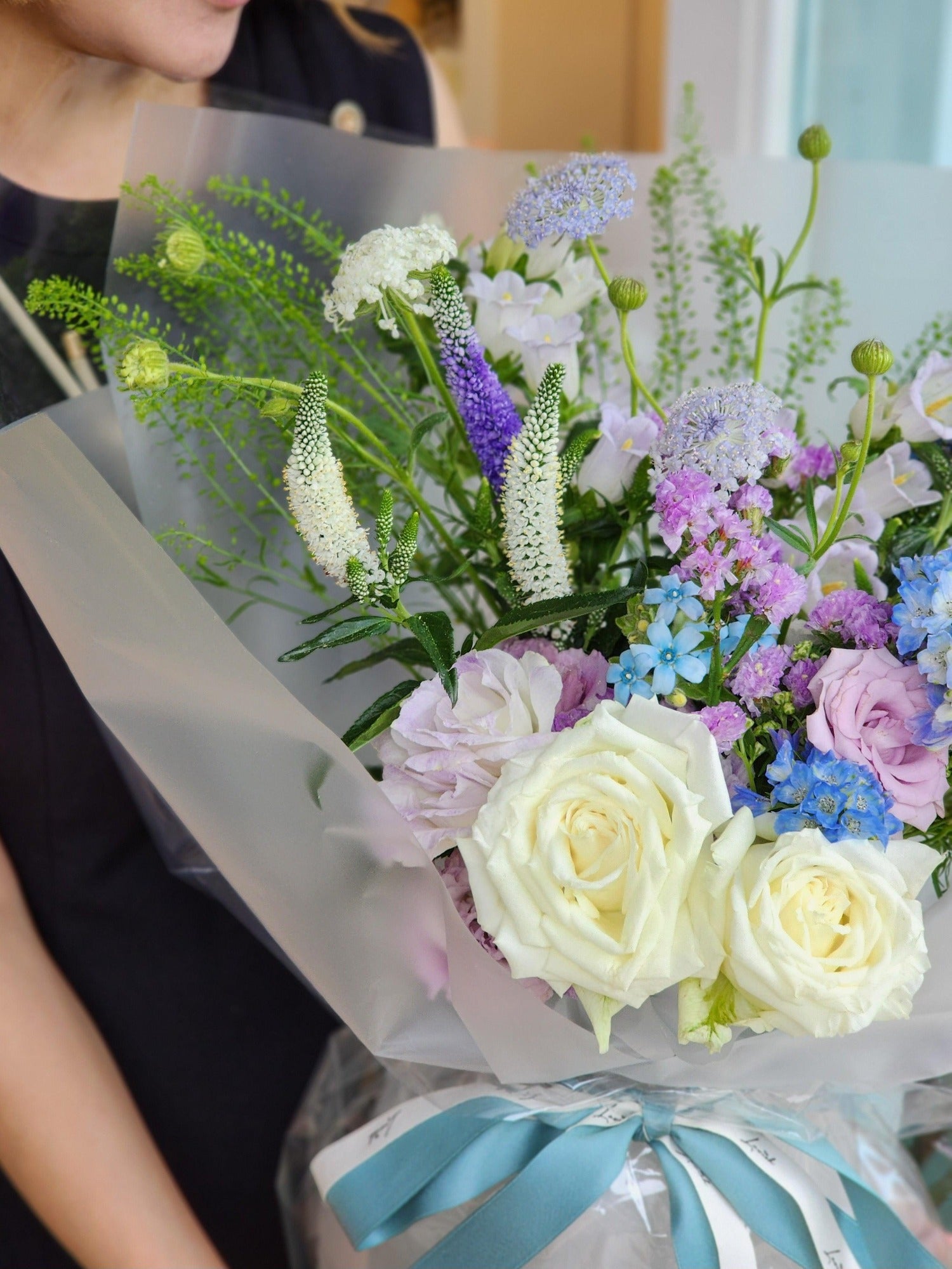 Soft white roses and stunning blue tweed bouque - Lavish Florist